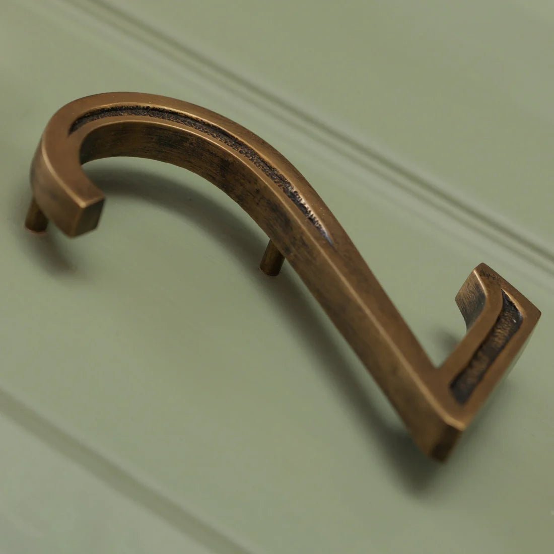 Brass bee Premium Floating Engraved House Numbers in Heritage Finish 0-9, featuring a sleek, curved design in an antique brass color, made from durable brass material.