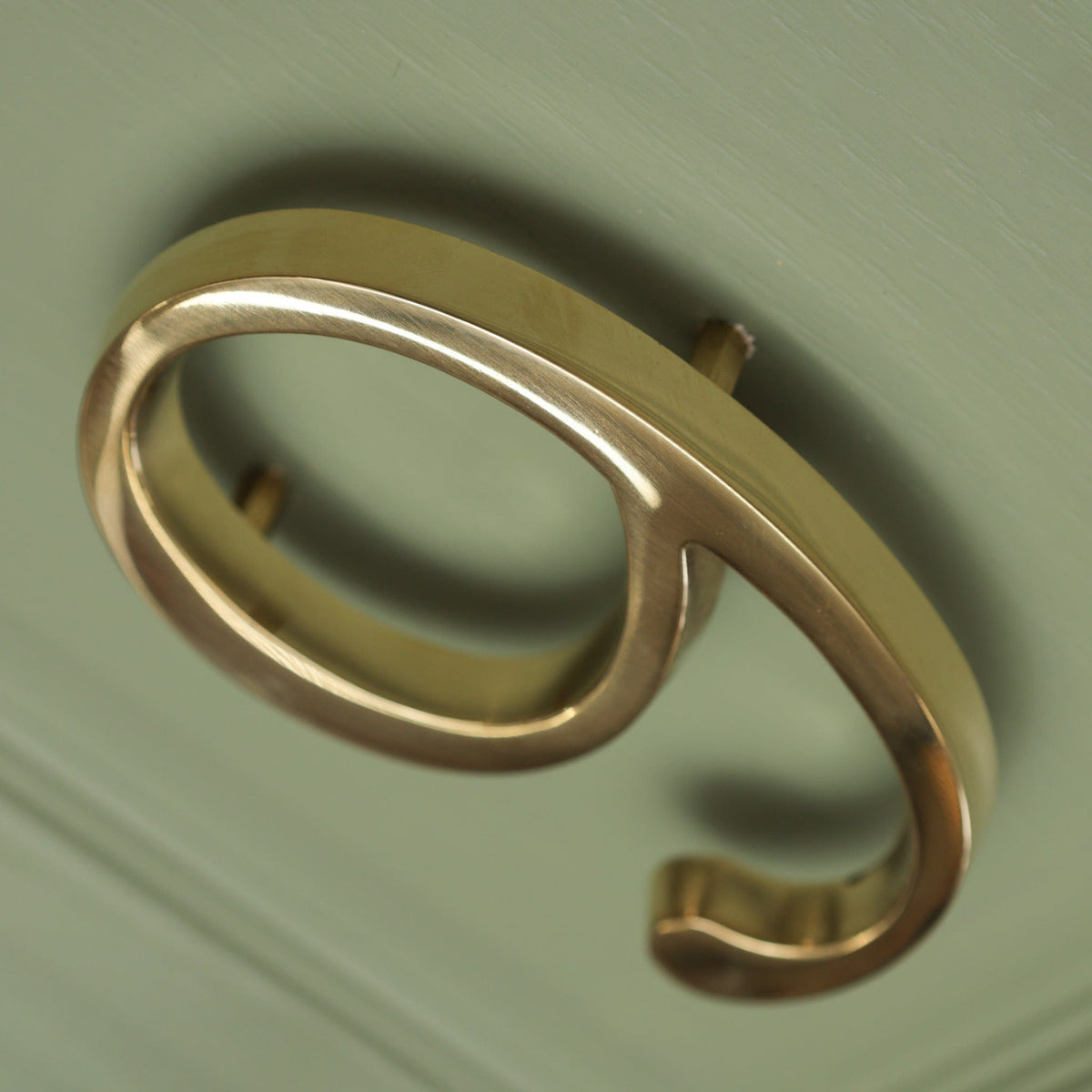Floating polished brass house number 9
