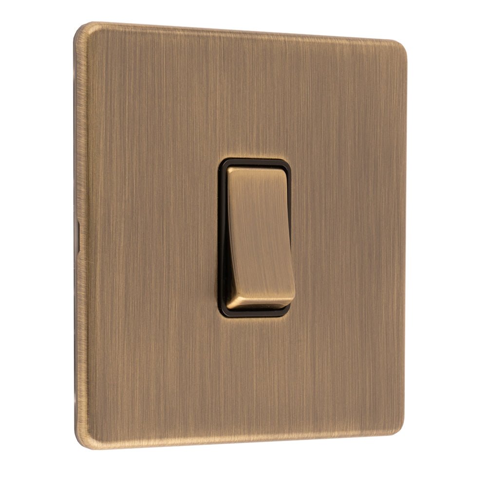 Eurolite Concealed 3mm 1 Gang Switch in antique brass, featuring a brushed finish and a rectangular toggle lever, designed for a subtle installation.