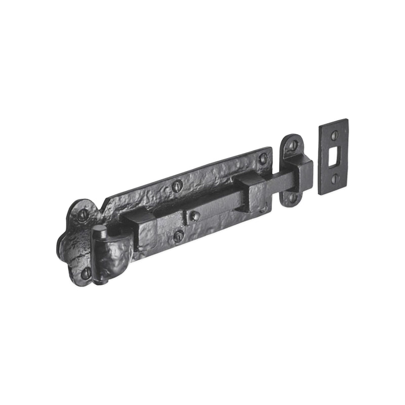 Spira Brass Straight Surface Bolt in a dark finish, featuring a rectangular design with a sliding mechanism and matching strike plate for secure closure.