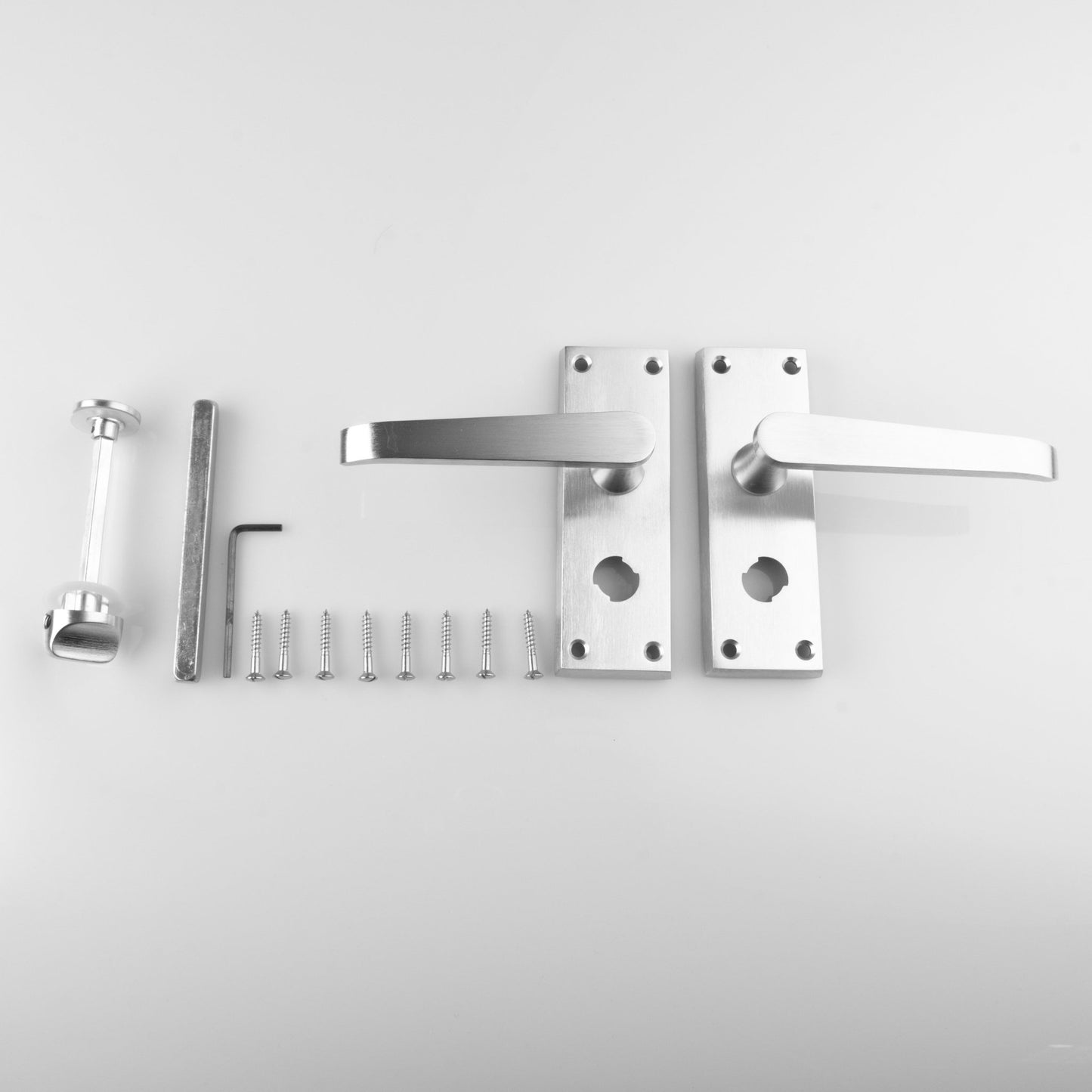 Carlisle Brass Contract Victorian Lever on Backplate featuring a sleek silver finish, includes two lever handles, backplates, screws, a spindle, and an Allen key for installation.