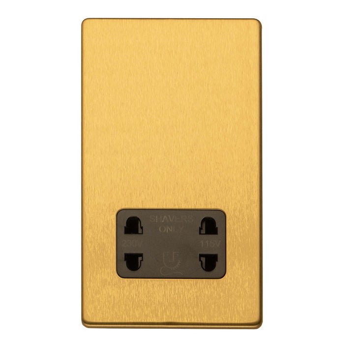 Eurolite Stainless Steel Shaver Socket in satin brass finish, featuring a smooth brushed surface and a black insert with three circular holes, designed for shaver use.