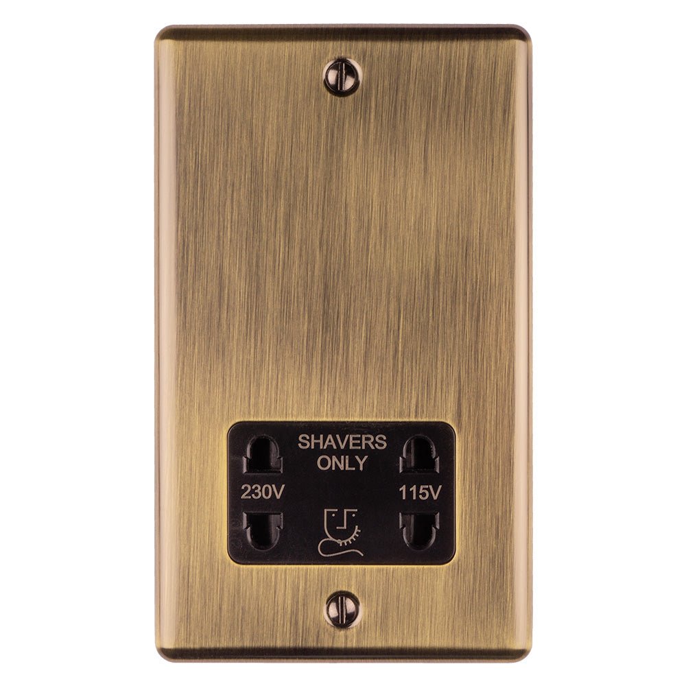 Eurolite Enhance Decorative Shaver Socket in antique finish, featuring a metal faceplate with dual voltage options for 230V and 115V, and a clear label indicating 'SHAVERS ONLY'.