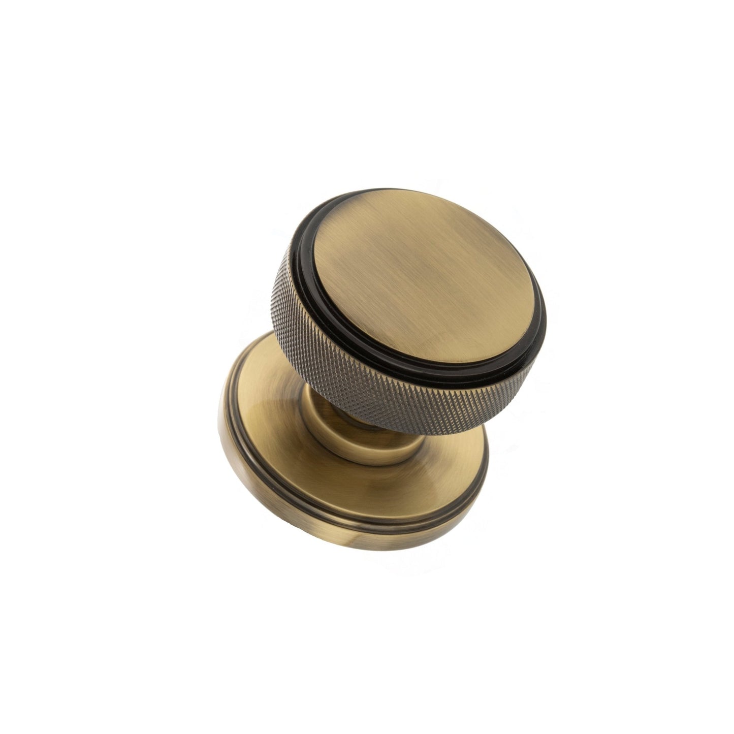 Atlantic Millhouse Brass Harrison Brass Knurled Mortice Knob on Concealed Fix Rose, featuring a round knob with knurled detailing and a smooth finish, designed in a warm brass color.