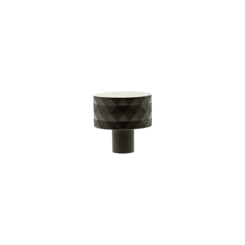 Atlantic Millhouse Brass Chrysler Diamond Round Cabinet Knob Handle in a matte black finish, featuring a geometric diamond texture on the knob and a cylindrical base.