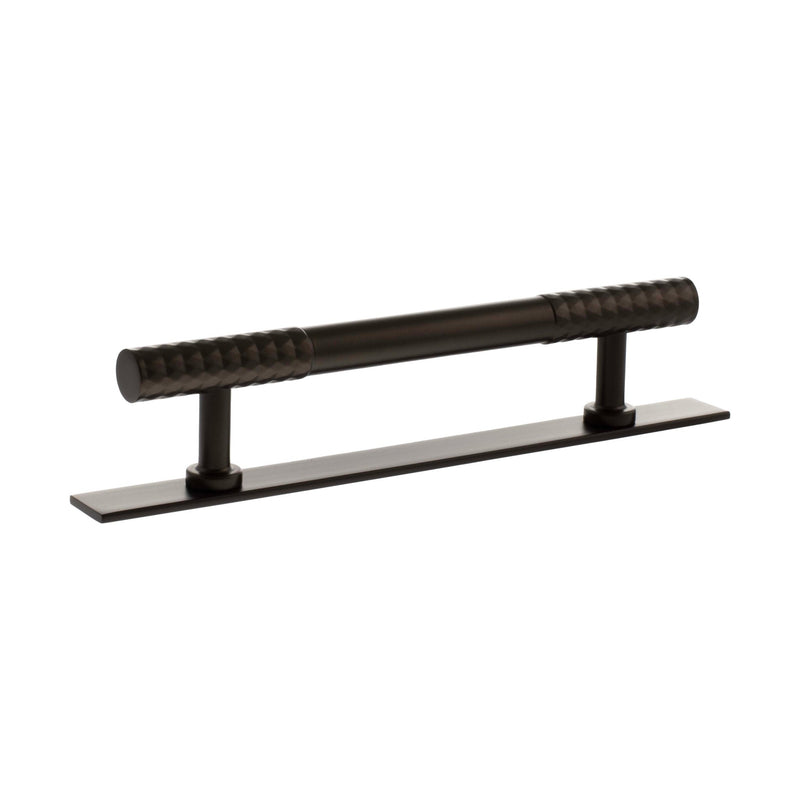 Atlantic Millhouse Brass Chrysler Diamond T-Bar Cabinet Pull Handle on Backplate in a dark finish, measuring 128mm in length, featuring textured grips and a rectangular backplate.
