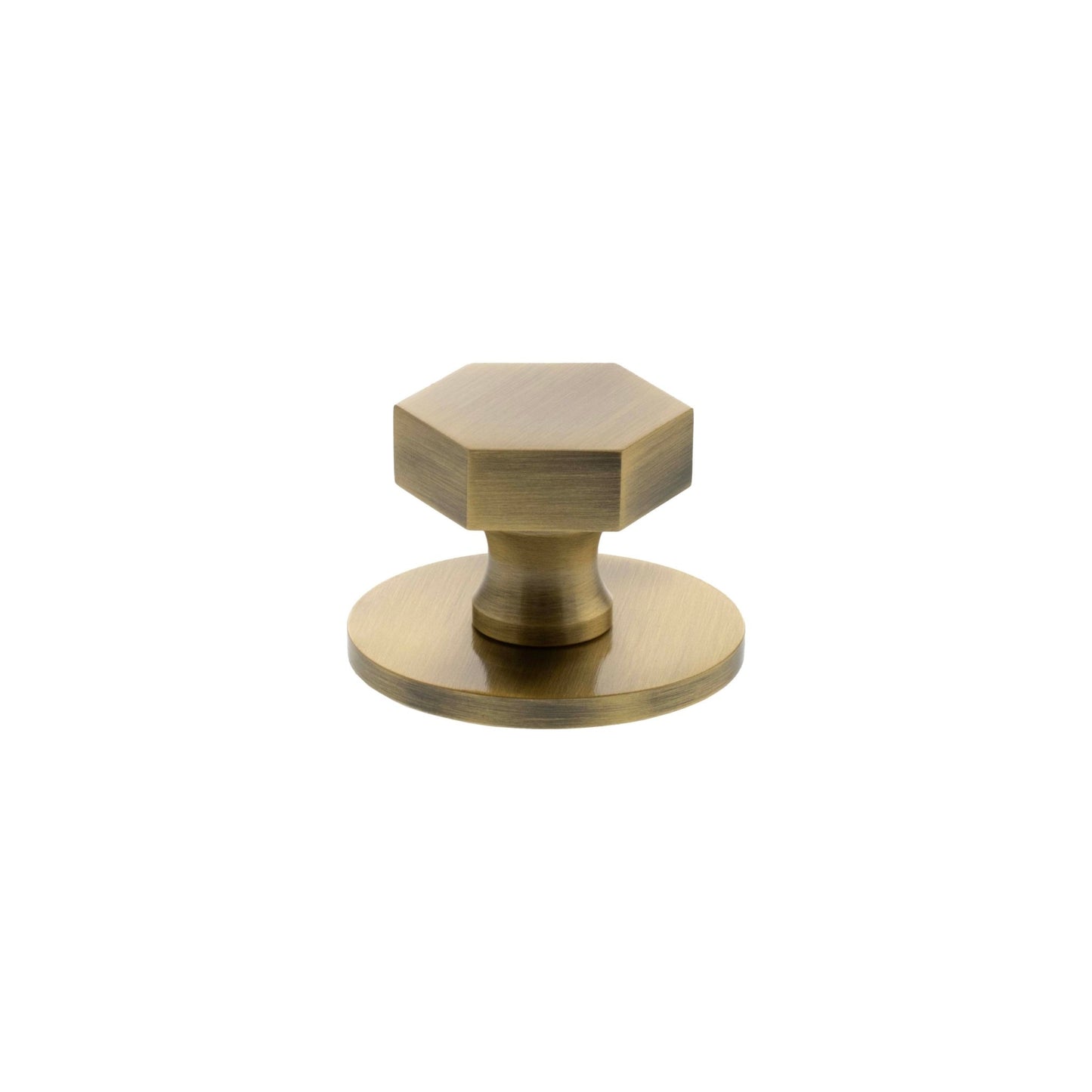 Atlantic Millhouse Brass Pennington Hexagonal Cabinet Knob Handle on Backplate with a hexagonal design in brushed brass finish, mounted on a circular backplate for smooth operation.
