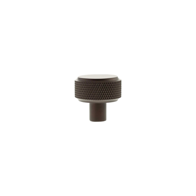 Atlantic Millhouse Brass Eiffel Knurled Round Cabinet Knob Handle in a dark finish, featuring a knurled texture on the surface and a round top for grip, designed for cabinetry.