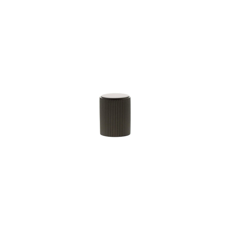 Atlantic Millhouse Brass Battersea Linear Cylinder Cabinet Knob Handle in a dark finish, featuring ribbed texture and a smooth top, designed for cabinet applications.