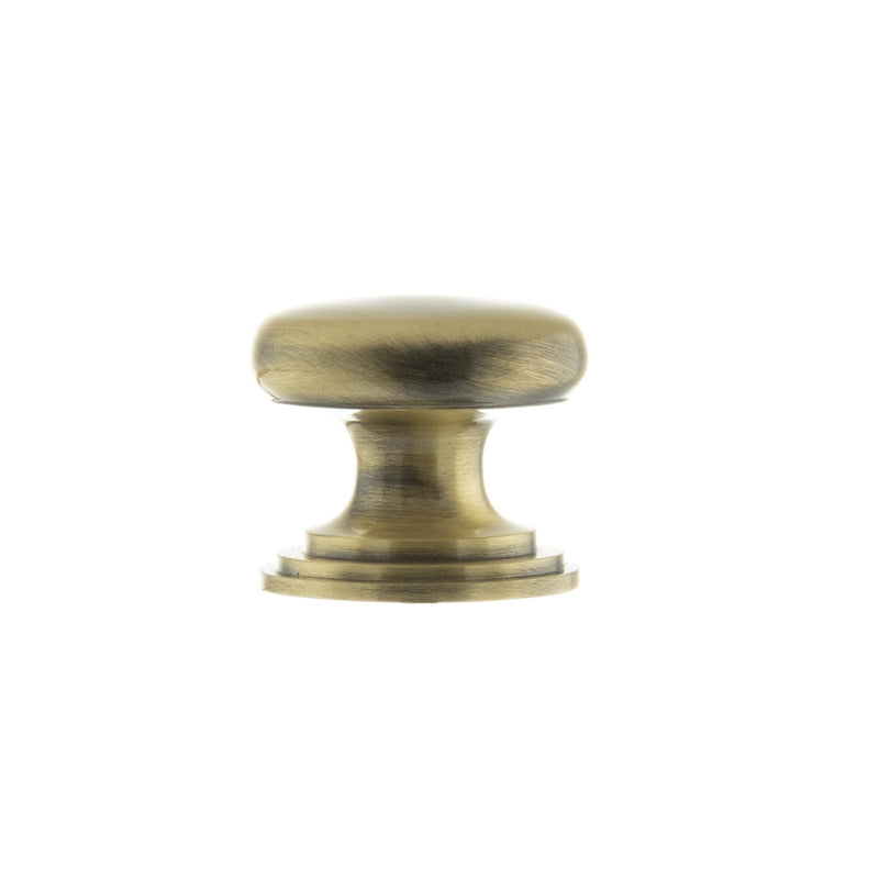 Atlantic Old English Lincoln Solid Brass Victorian Cabinet Knob in a 38mm size with a concealed fix. The knob features a rounded, polished design with a slightly flared base, showcasing its classic Victorian style.