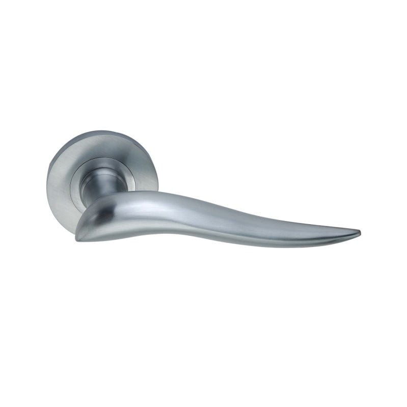 Spira Brass Flavia Lever Door Handle in brushed nickel finish with a sleek, curved design, mounted on a round rose. The handle features a smooth surface and ergonomic shape for ease of use.
