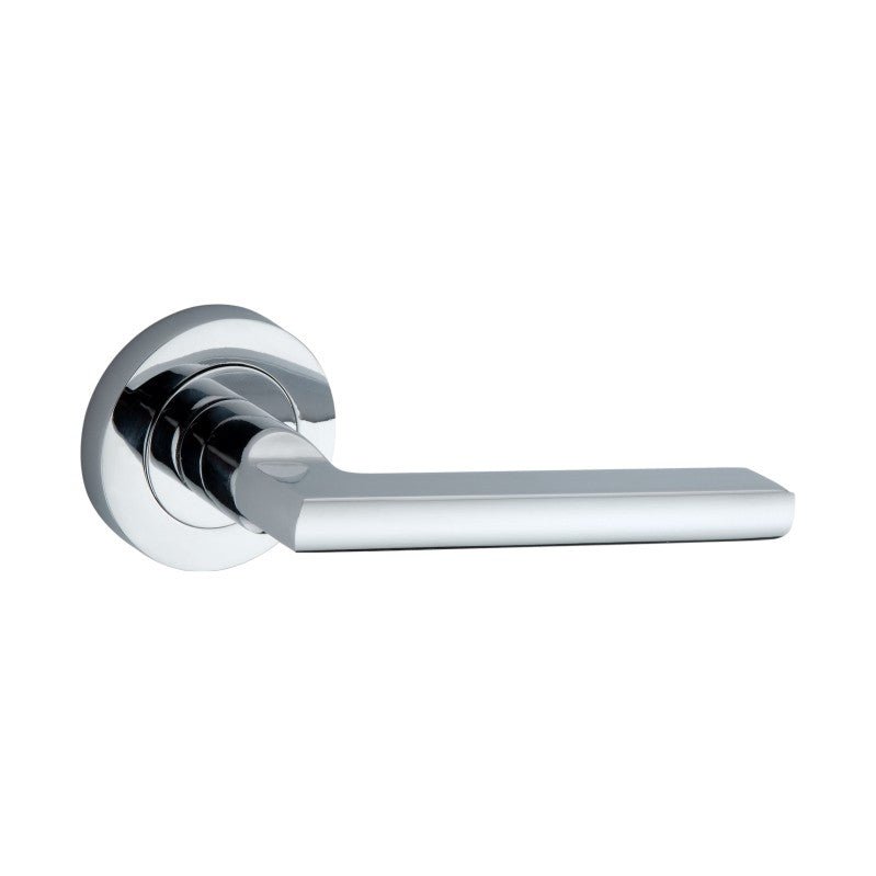 Spira Brass Drox Lever Door Handle in polished chrome, featuring a sleek, rectangular lever design attached to a round rose plate.