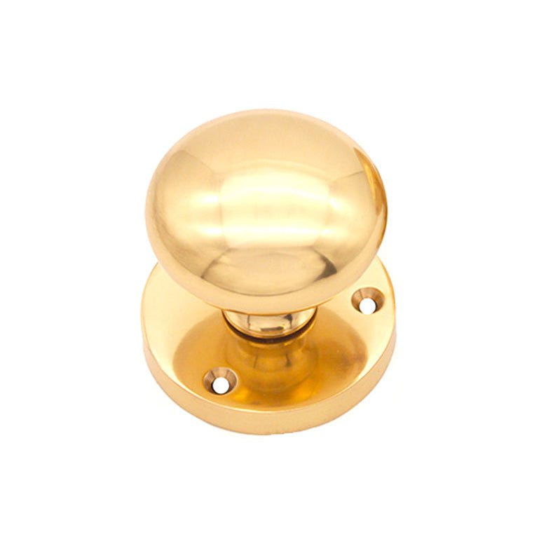 Spira Brass Victorian Door Knob – Mortice in polished brass finish, featuring a round knob design and a circular base with three mounting holes for easy installation.