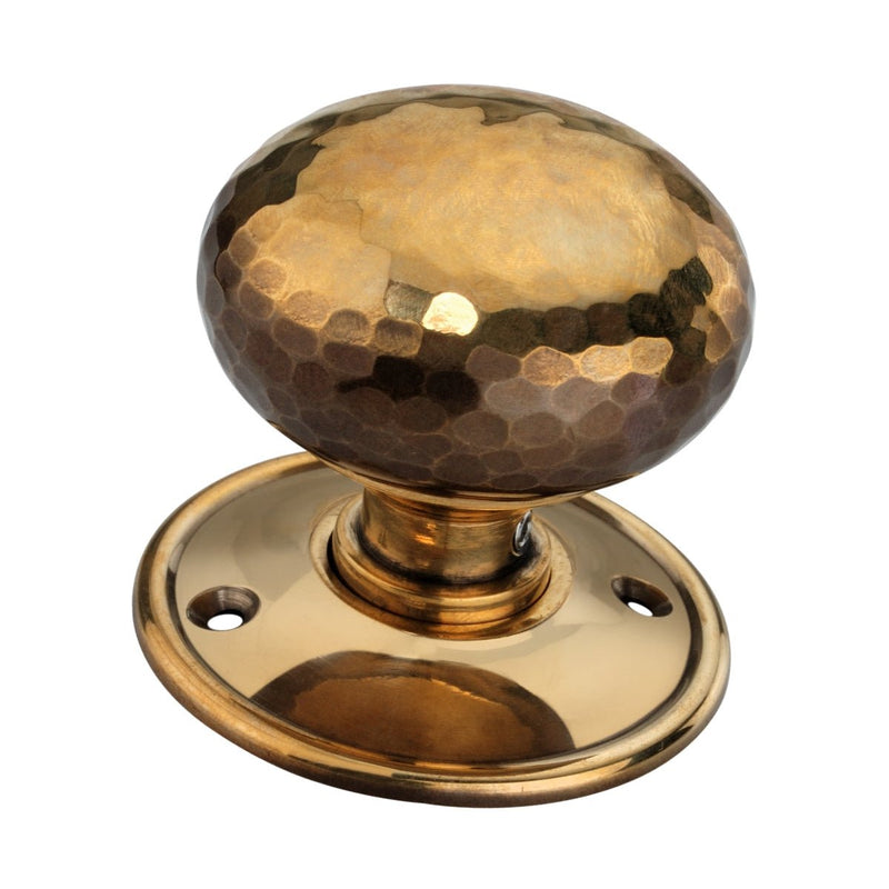 Spira Brass Hammered Cottage Large Mortice/Rim Door Knob in a gold finish, featuring a textured, hammered round knob and a circular base plate with screw holes for installation.