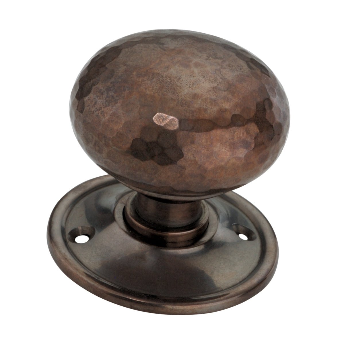 Spira Brass Hammered Cottage Large Mortice/Rim Door Knob featuring a textured, oval-shaped bronze knob mounted on a round backplate, designed for traditional door applications.