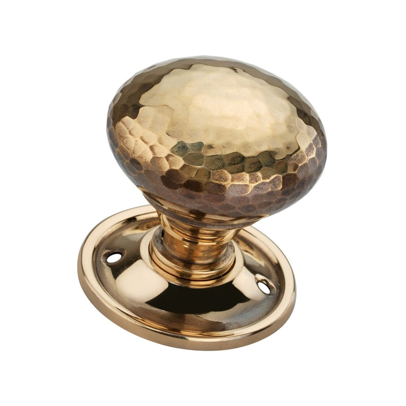 Spira Brass Hammered Mushroom Mortice/Rim Door Knob with a polished gold finish and a textured, hammered surface, mounted on a round backplate.