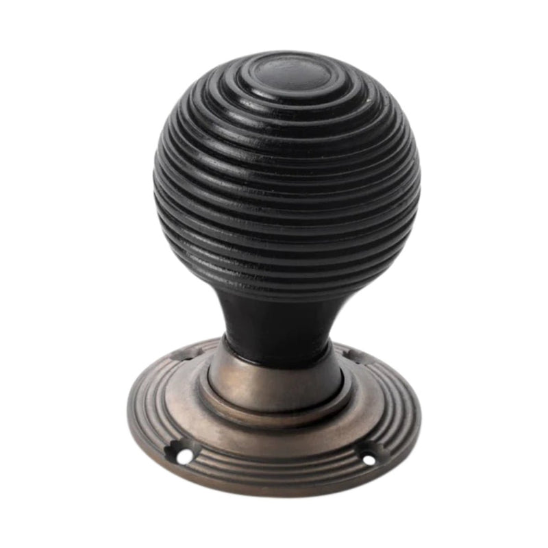 Spira Brass Ebonised Beehive Mortice/Rim Door Knob in black finish, featuring a ribbed spherical design and a circular base with a decorative edge.