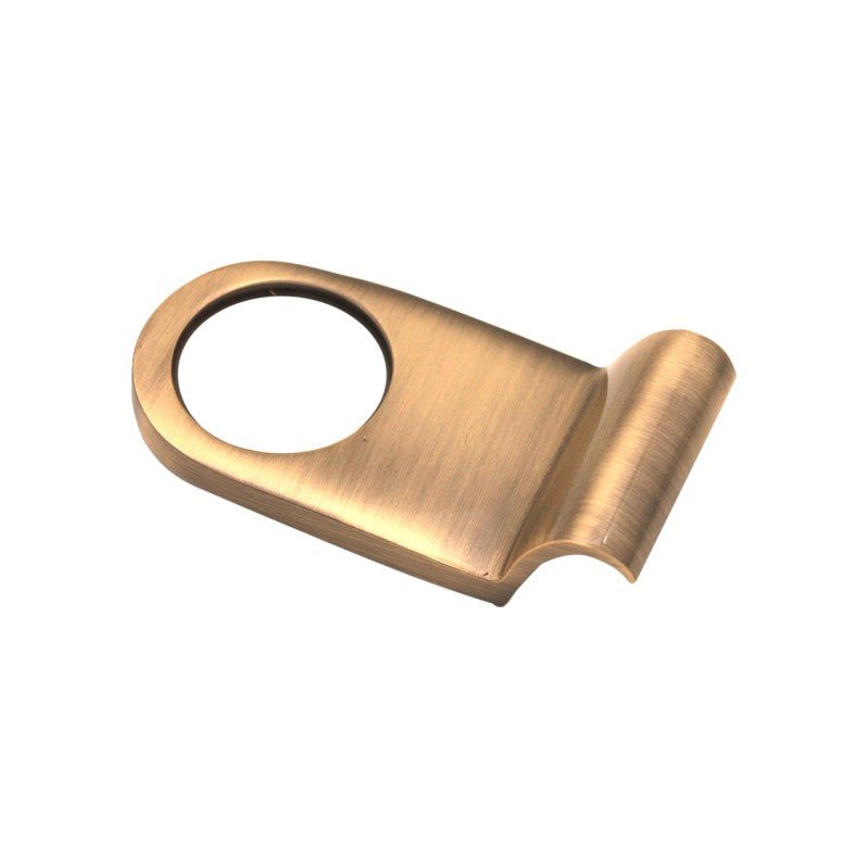 Spira Brass Victorian Cylinder Pull in a brushed brass finish, featuring a rounded handle with a circular opening and a flat base for installation.
