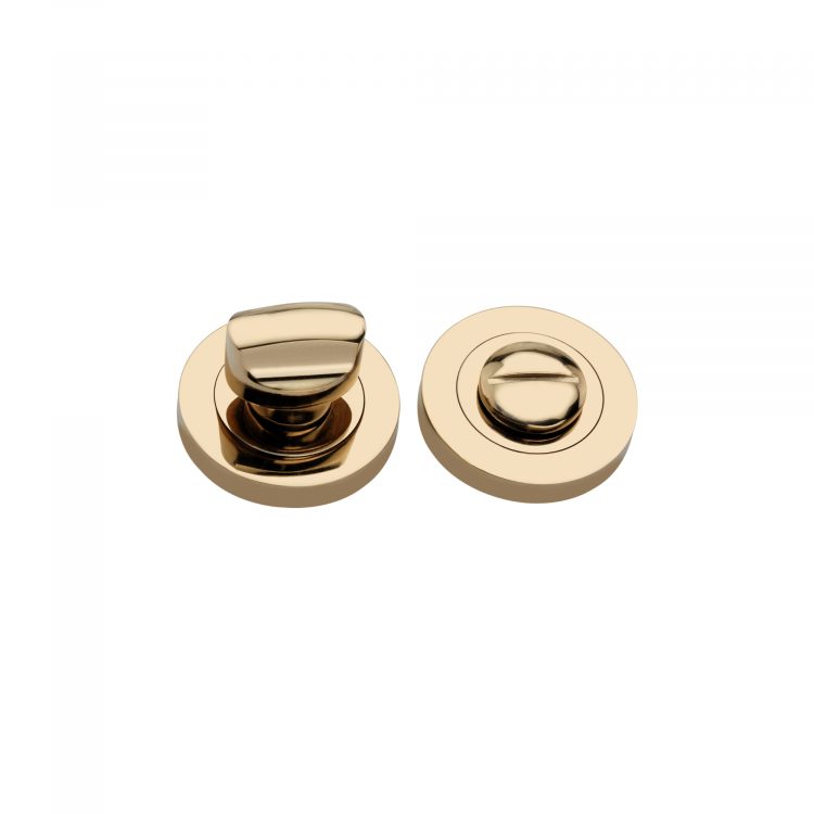 Spira Brass Standard Turn & Release in polished brass finish, featuring a round backplate and a toggle lever for locking. The sleek design is suitable for interior doors.