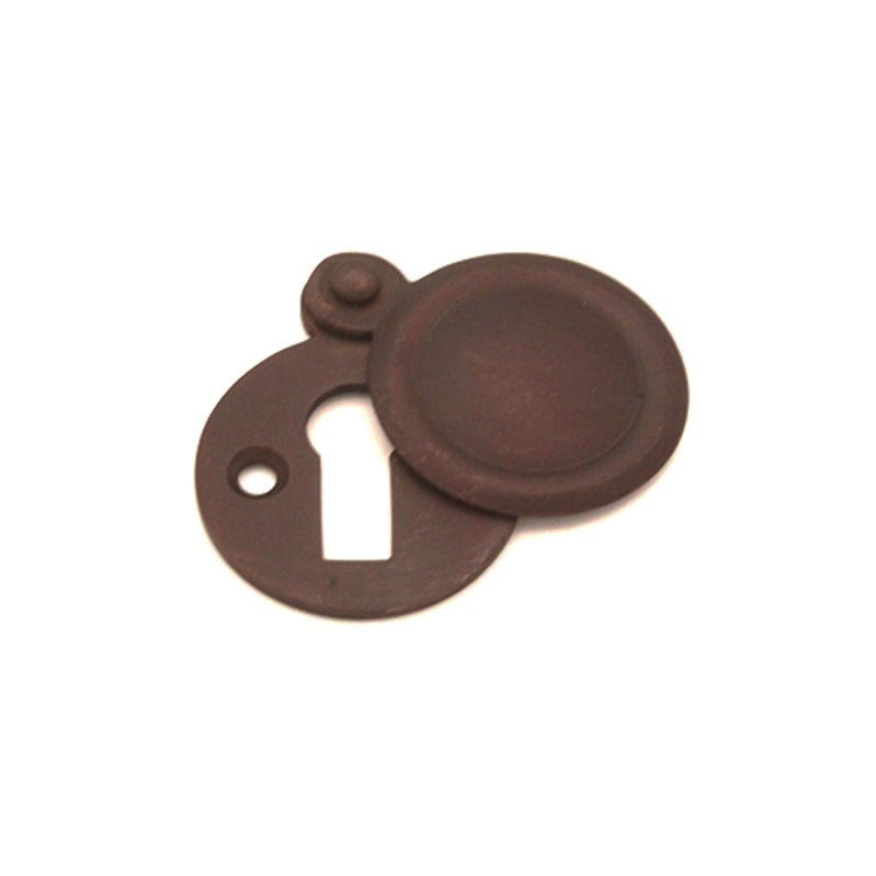 Spira Brass Victorian Key Hole Covered Escutcheon in a dark bronze finish, featuring a circular cover and rectangular keyhole opening, designed for decorative and functional use on doors or furniture.