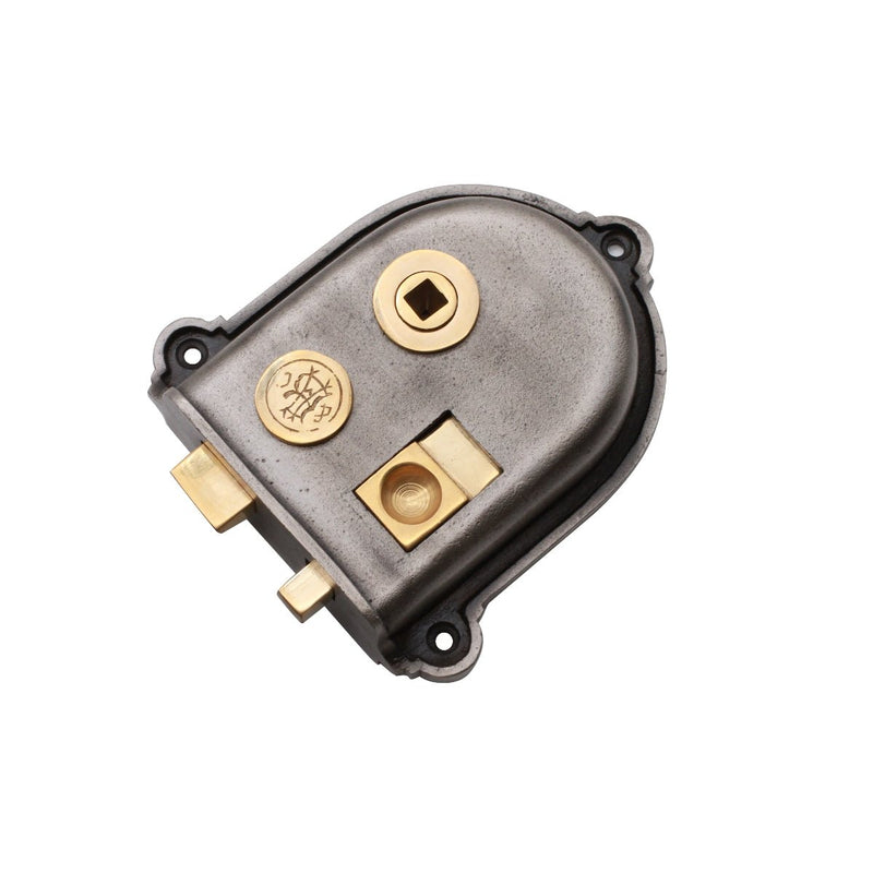 Spira Brass Cromwell Rim Latch with a metallic housing and gold-toned latch mechanism, featuring a square groove for the key and an additional circular opening.