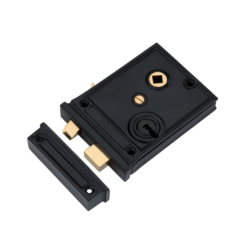 Spira Brass Horizontal Rim Lock in black with gold accents, featuring a keyhole and a square driver hole, shown with a matching black strike plate.