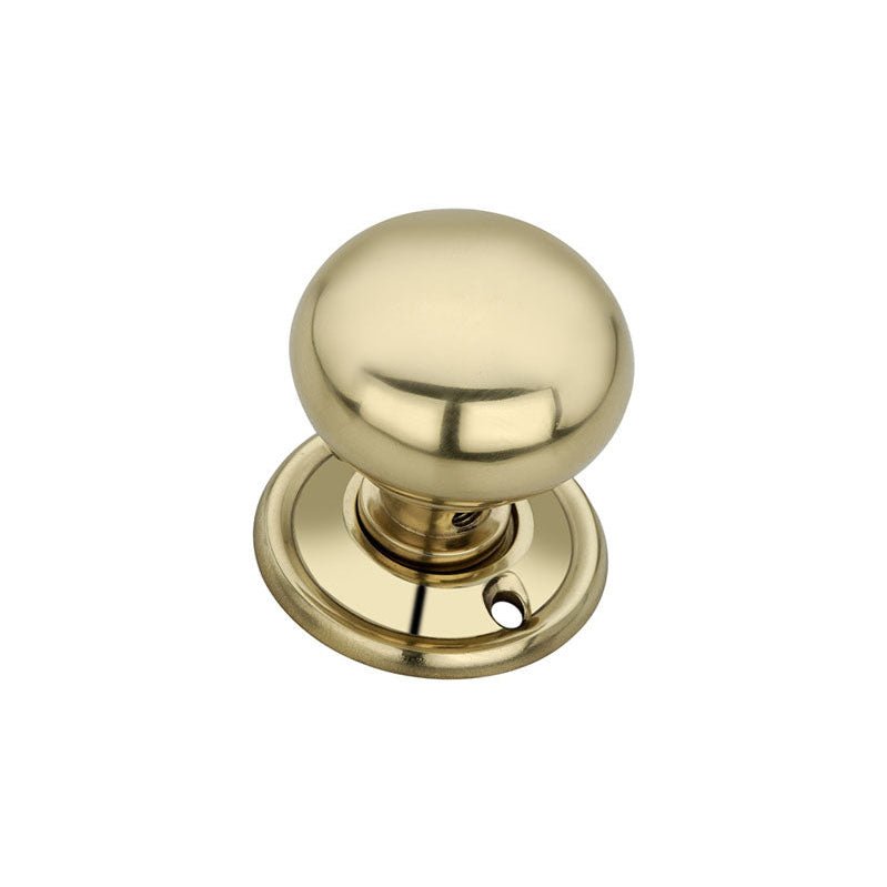 Spira Brass Cottage Small 40mm Rim/Mortice Door Knob in polished brass finish, featuring a round design with a smooth surface and a circular base.