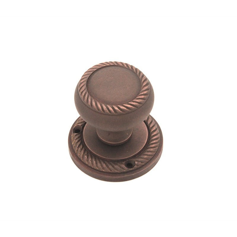 Spira Brass Georgian Mortice Door Knob in antique bronze finish, featuring a round knob with a rope-like design and a circular base plate with screw holes for installation.