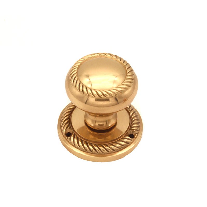 Spira Brass Georgian Mortice Door Knob in polished brass featuring a round knob with a decorative rope design and circular backplate, designed for mortice installations.