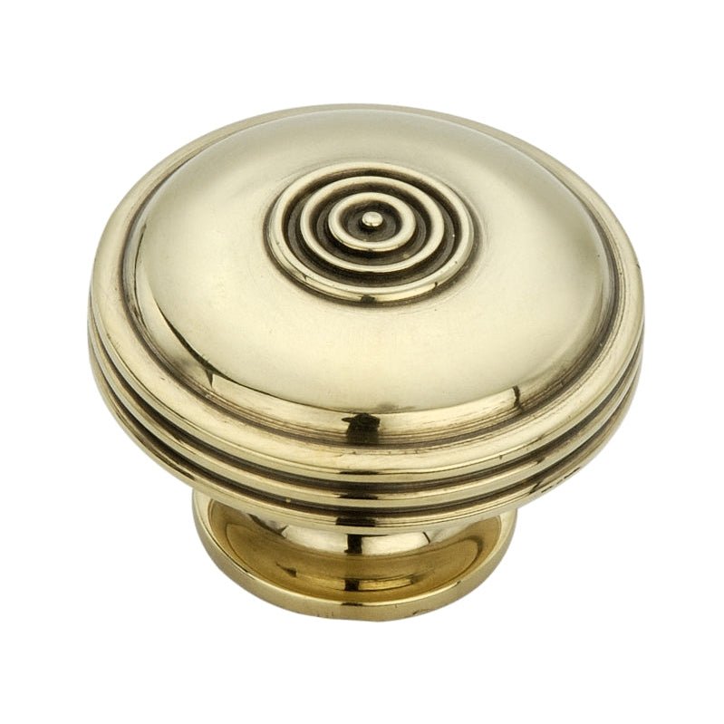 Spira Brass Bloxwich Large 40mm Cupboard Knob in a polished brass finish, featuring a circular design with concentric rings and a rounded base.