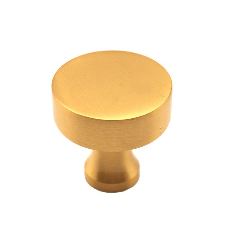 Spira Brass Round Cupboard Knob in a brushed brass finish, featuring a circular top and a smooth straight stem for mounting.