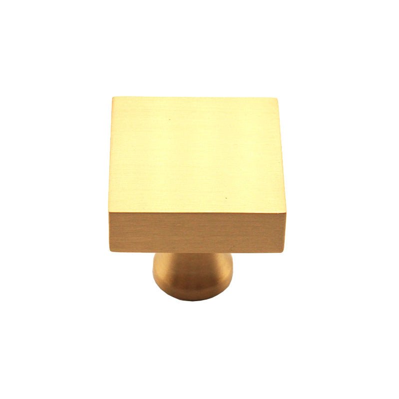 Spira Brass Square Cupboard Knob with a square shape in a brushed gold finish, featuring a smooth surface and a cylindrical base for installation.