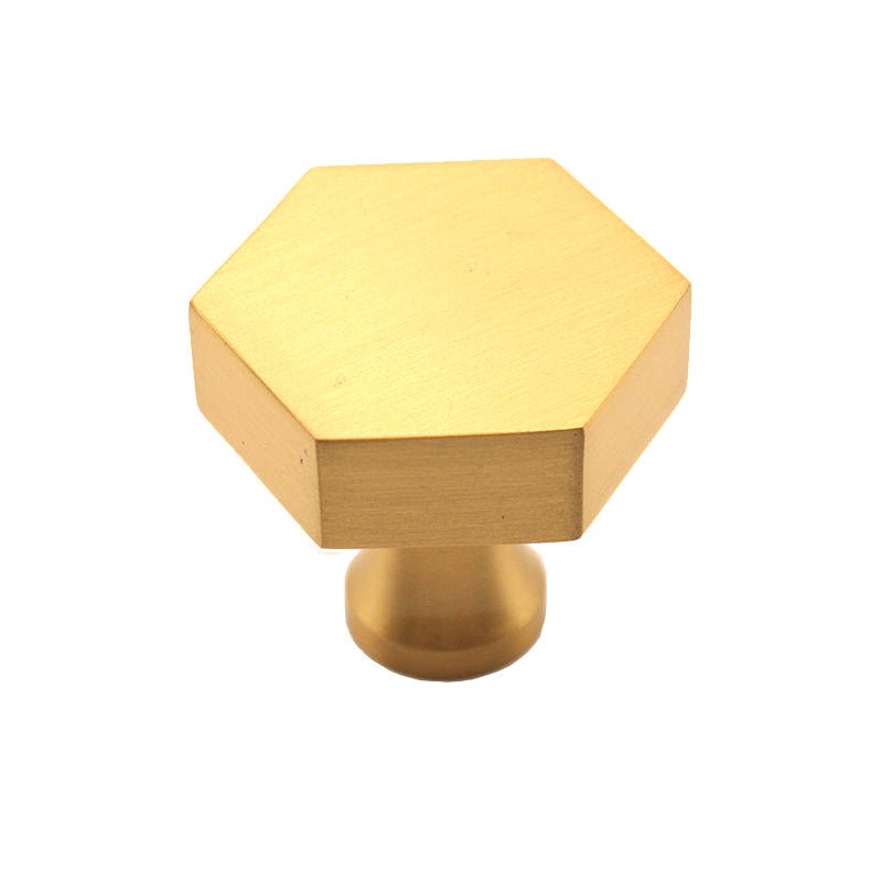 Spira Brass Hexagonal Cupboard Knob in a brushed gold finish, featuring a geometric hexagonal design and a round base for easy installation.