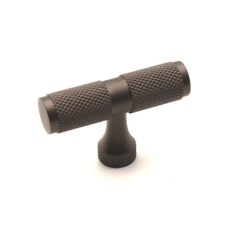 Spira Brass Knurled T Bar Cupboard Pull in a dark bronze finish, featuring a textured grip and a T-shaped design for easy handling.