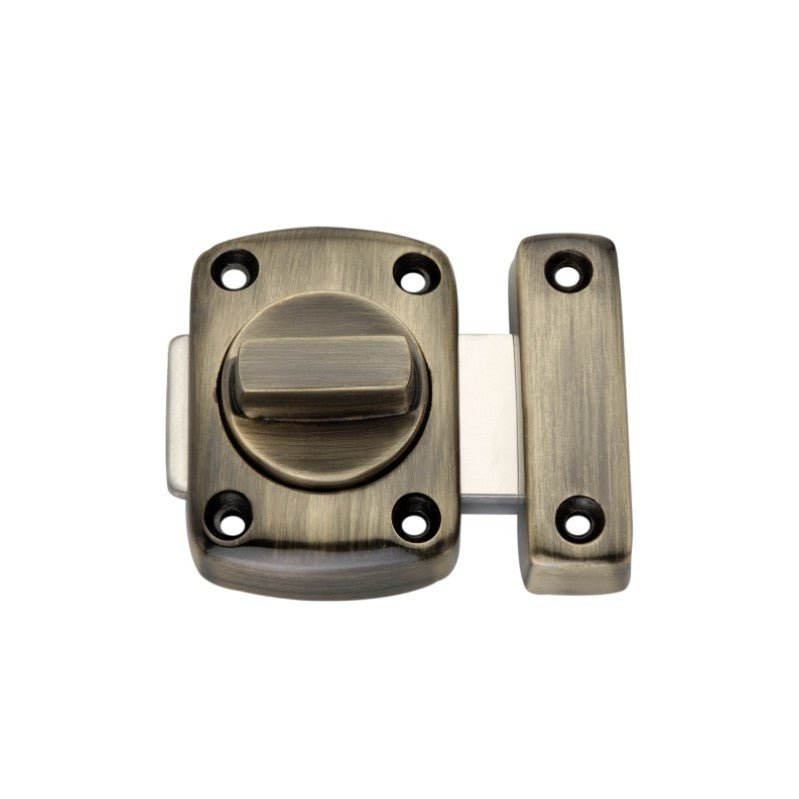 Spira Brass Sigma Bathroom Latch Small in an antique brass finish, featuring a round knob mechanism and a rectangular strike plate, suitable for securing bathroom doors.