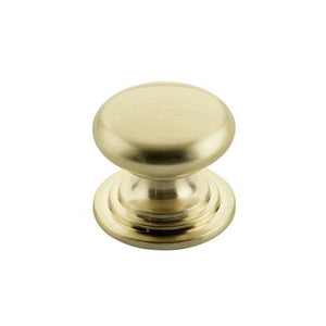 Zoo Hardware Round Cabinet Knob in a brushed brass finish, featuring a round design with a diameter of 37mm, mounted on a raised base.