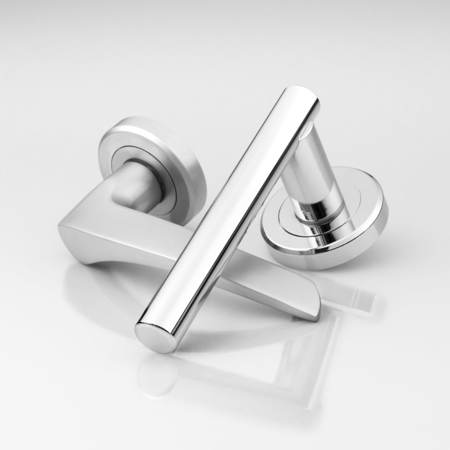Carlisle Brass Olivier Lever On Rose in polished chrome, featuring a sleek lever design and a circular rose plate. The product shows a modern aesthetic with clean lines and a reflective surface.