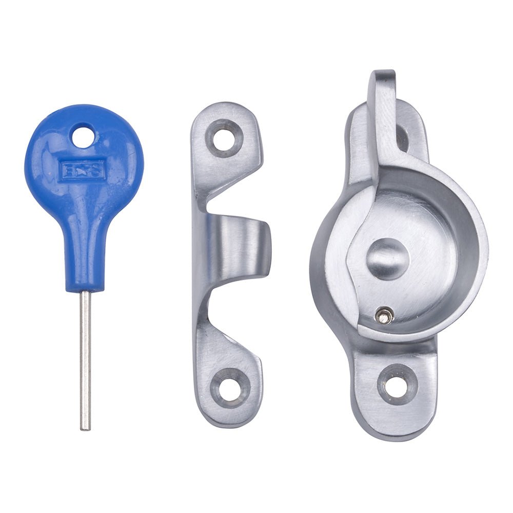 Carlisle Brass Fitch Pattern Sash Fastener featuring a silver finish, including a circular fastener housing, a receiving plate, and a blue key for operation.