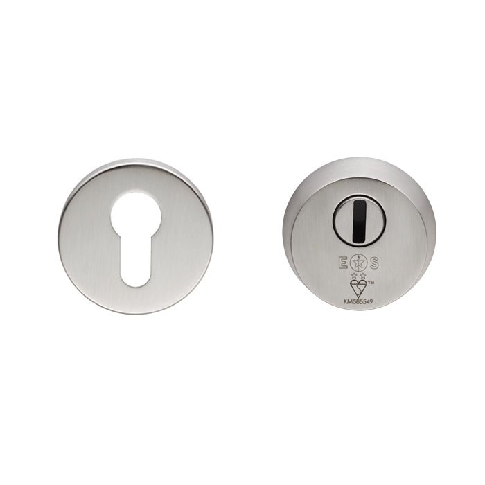 Carlisle Brass 2 Star Security Escutcheon in a satin nickel finish, featuring a keyhole design and a round shape. The escutcheon provides a decorative and protective cover for door locks.