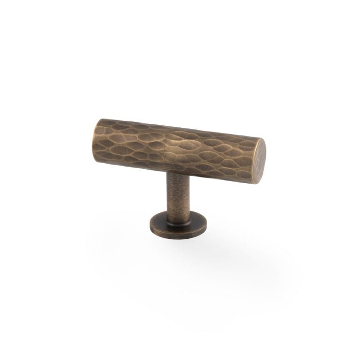 Alexander & Wilks Leila Hammered T-Bar Knob in antique bronze finish, featuring a textured surface and a cylindrical base for easy grip.