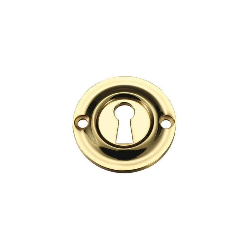 Zoo Hardware Std. Key Profile Escutcheon in polished brass, featuring a circular design with a keyhole at the center and two mounting holes.