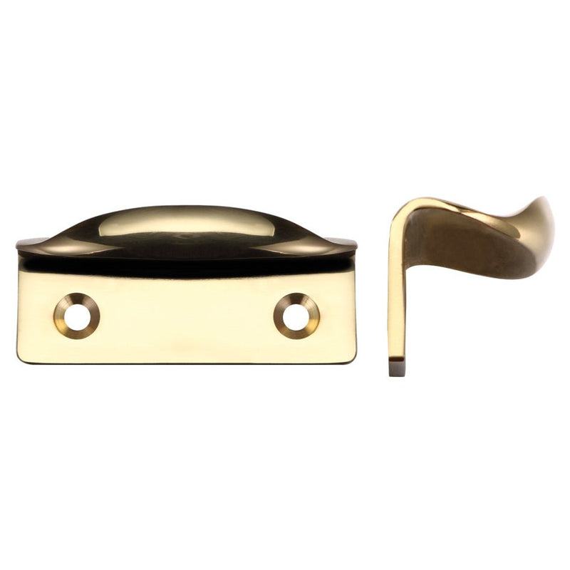 Zoo Hardware Sash Lift, measuring 60 x 22mm, in a polished brass finish. The lift features a curved design with two screw holes for easy installation, suitable for window sashes.