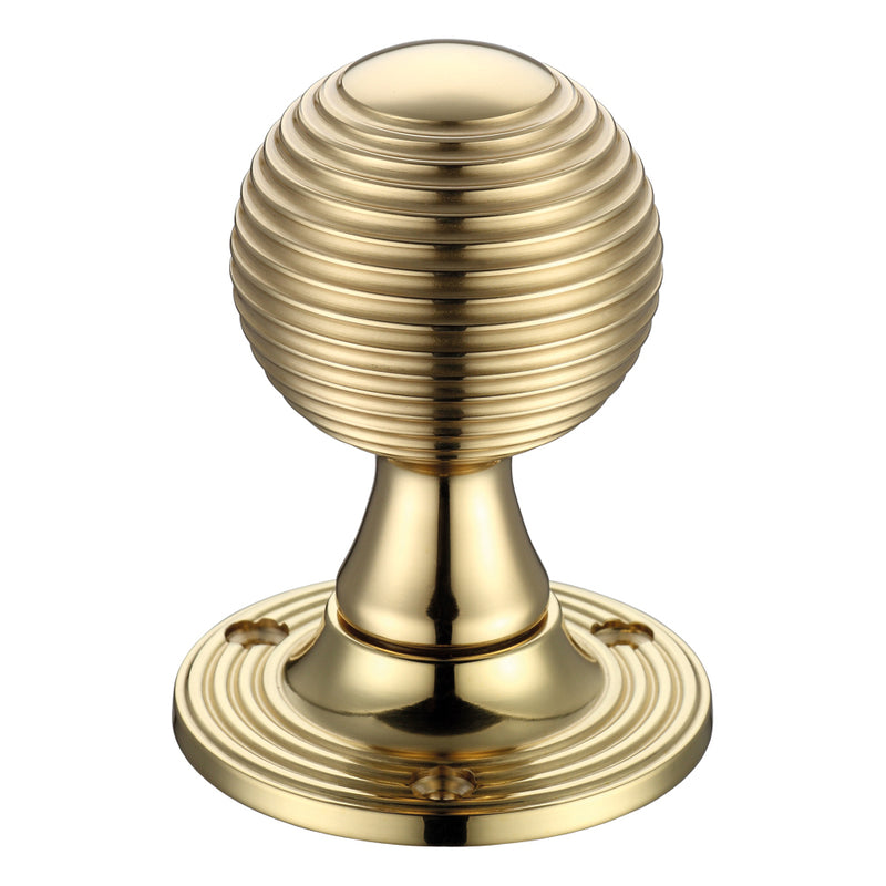 Zoo Hardware Queen Anne Mortice Knob in a polished brass finish, featuring a round, ribbed design and a 60mm diameter rose base with a circular, ridged plate.
