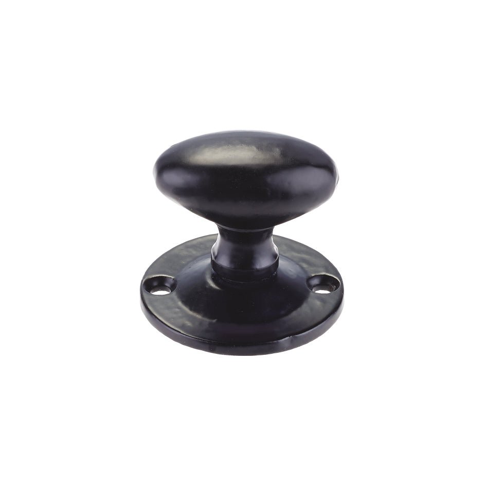 Zoo Hardware Oval Rack Bolt Thumb Turn in black, featuring a simplified oval knob design mounted on a circular base with three screw holes for installation.