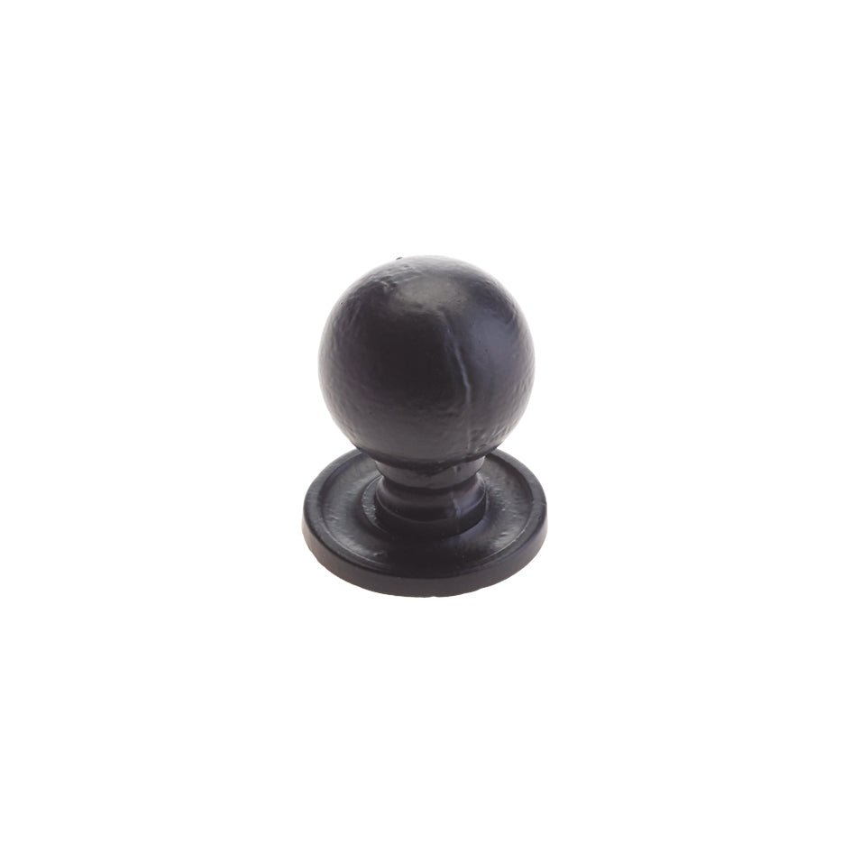 Zoo Hardware Round Cupboard Knob in black, measuring 33mm in diameter, featuring a round design with a smooth surface and a circular base for mounting.