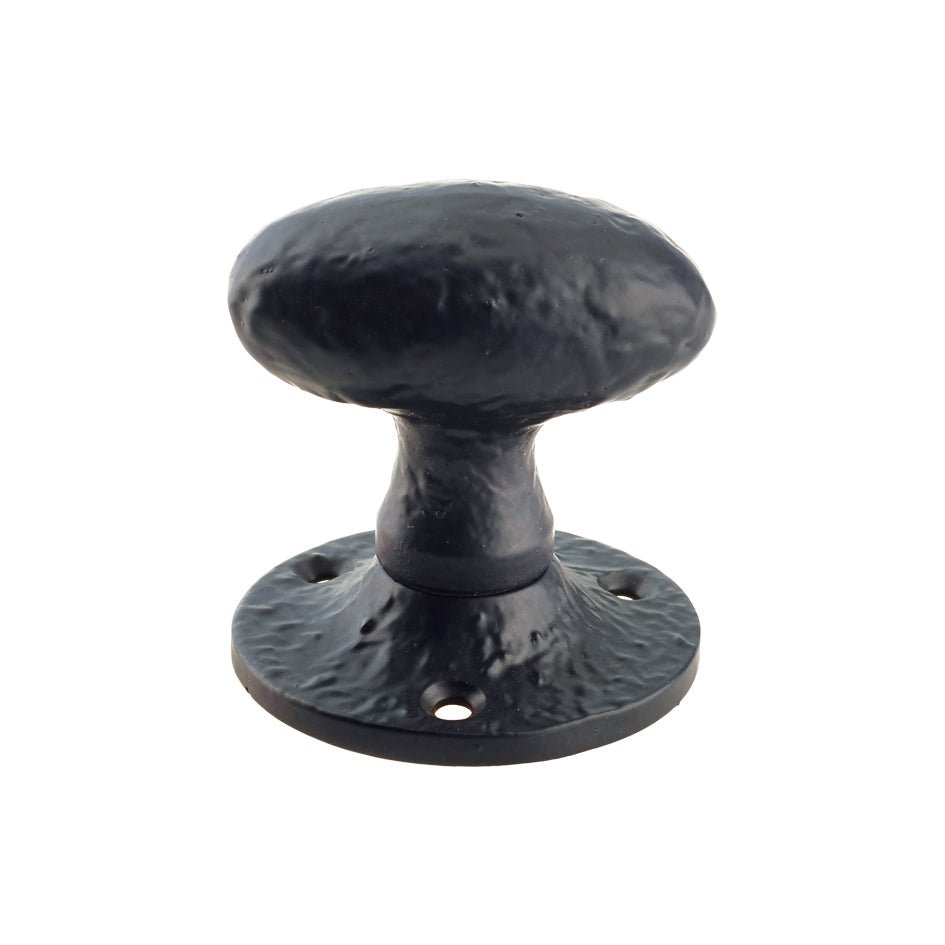 Zoo Hardware Oval Mortice Knob in a black finish, measuring 2.5 inches in diameter, features an un-sprung design with a textured surface and a circular base for secure installation.