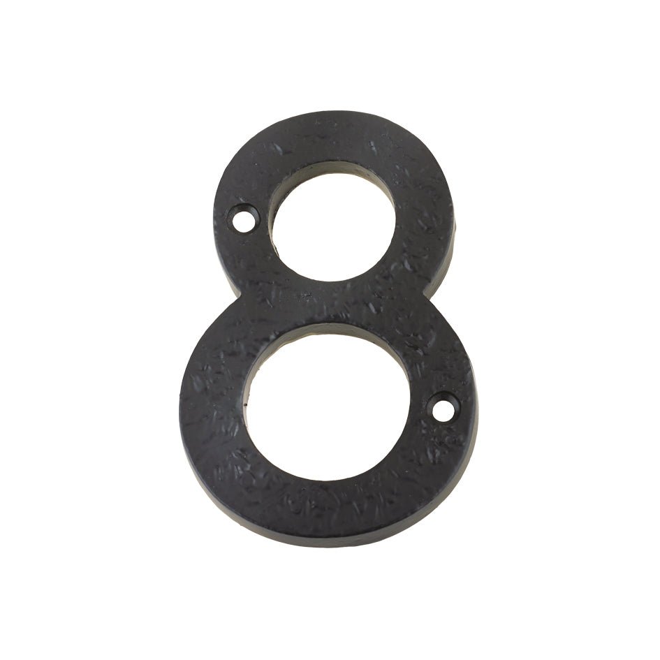Zoo Hardware Numeral - 4" made of textured black metal, featuring a circular design with two holes for mounting.