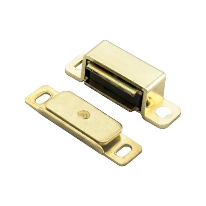 Carlisle Brass Superior Steel Magnetic Catch in a polished brass finish, featuring a small rectangular magnet and a flat plate, designed for securing doors or cabinets with magnetic closure.