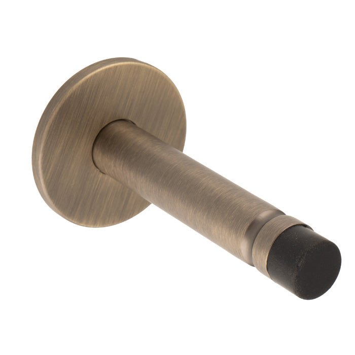 Carlisle Brass Hat and Coat Hooks in a satin brass finish, featuring a round backplate and a polished black tip for hanging items securely.