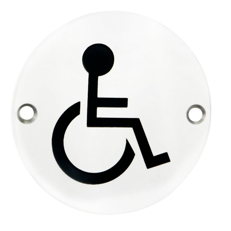 Carlisle Brass Disabled Symbols sign featuring a black depiction of a wheelchair symbol on a round clear background, with two mounting holes.